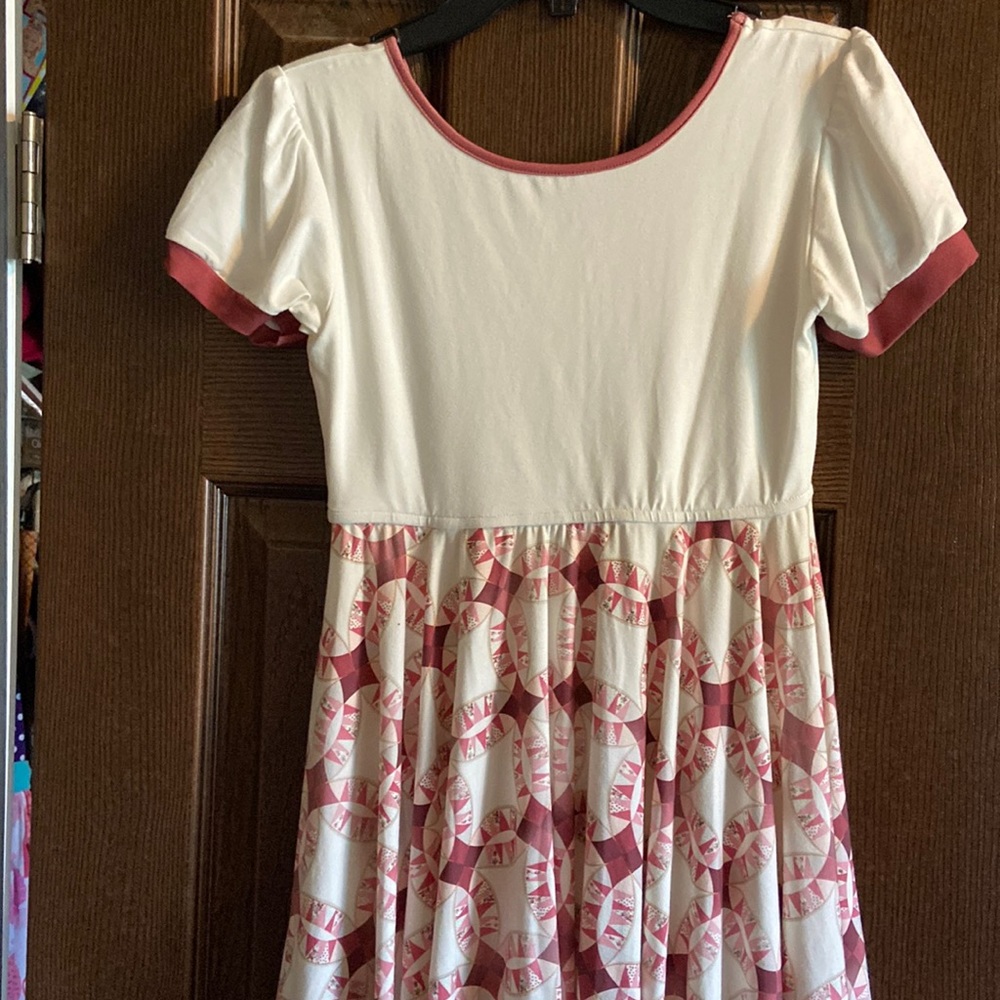 Omi Jo Dress. Has pockets Size 11/12.